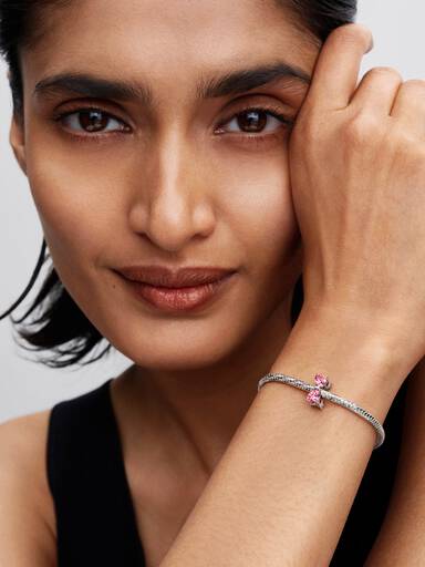 Rosafarbene Schleife Charm